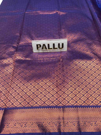 Purple and brown patterned fabric with a 'PALLU' label.