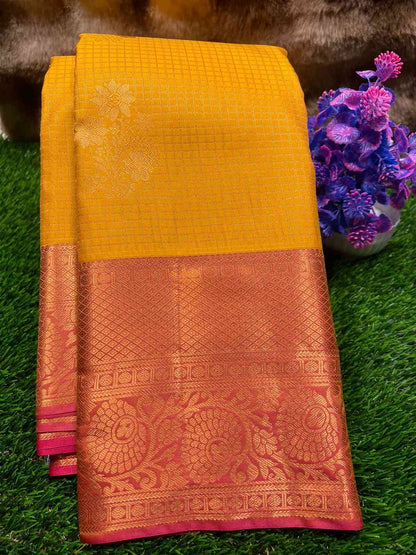 Yellow and floral decoration on a green background