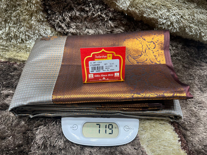 Fabric with a label on a digital scale against a textured background