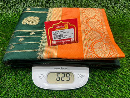 Sari on a digital scale with a visible brand label on a grass background