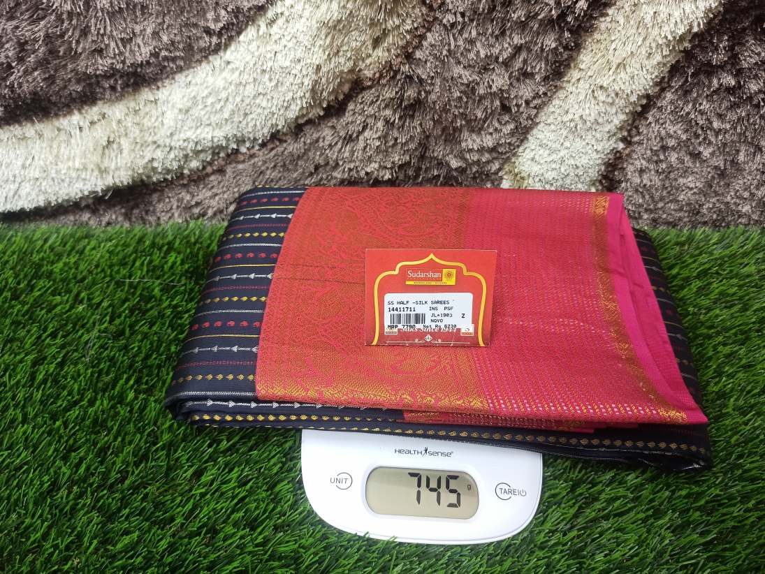 Pure Kanchipuram Silk Saree.