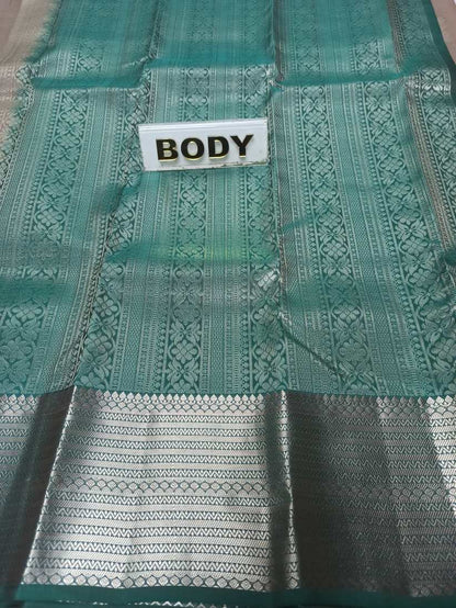 Pure Kanchipuram Silk Saree.