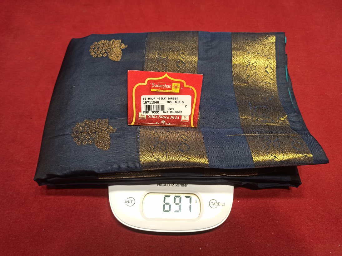 Pure Kanchipuram Silk Saree.