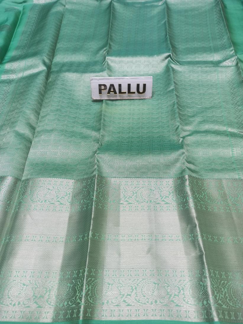 Pure Kanchipuram Silk Saree.