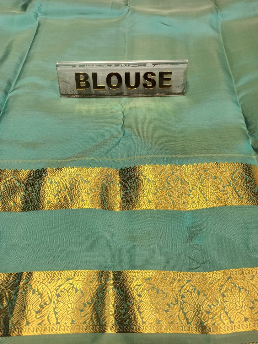 Pure Kanchipuram Silk Saree.