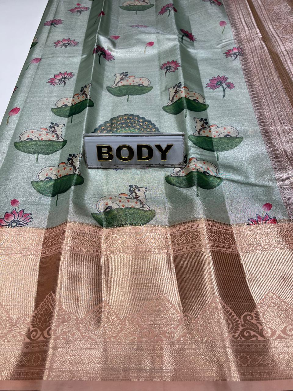 Sari with floral patterns and 'BODY' label on a white background