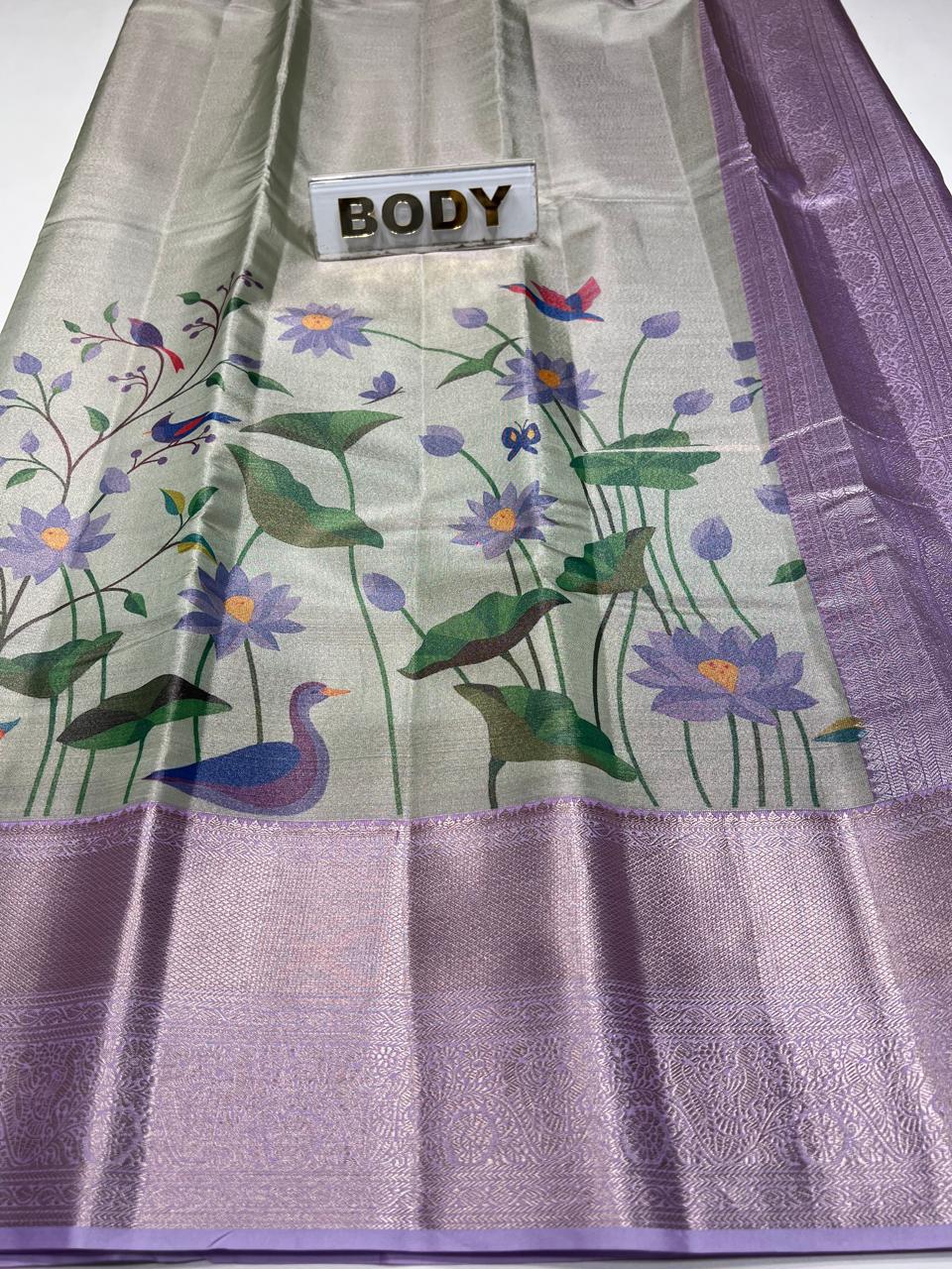 Saree with floral and duck design on a white background