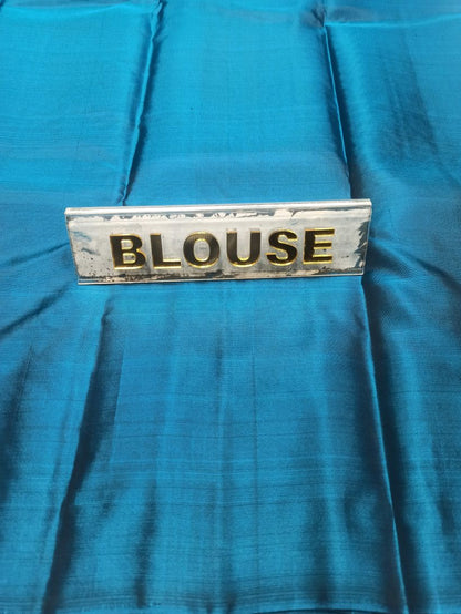 Pure Kanchipuram Silk Saree.