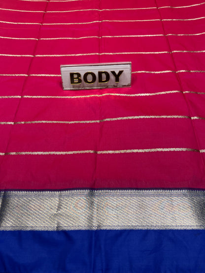 Close-up of a fabric with a 'BODY' label on a red, gray, and blue background