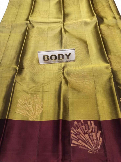 Green and maroon fabric with a label labeled 'BODY'.