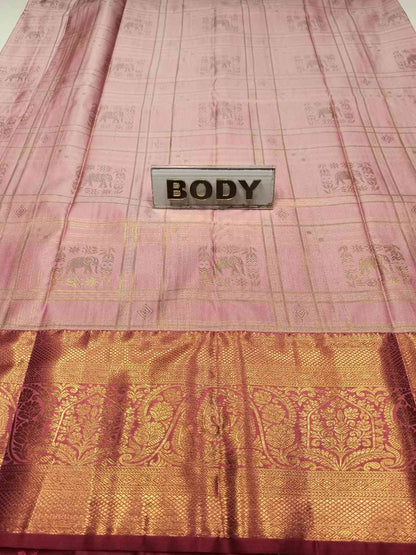 Pink and gold traditional fabric with 'BODY' label
