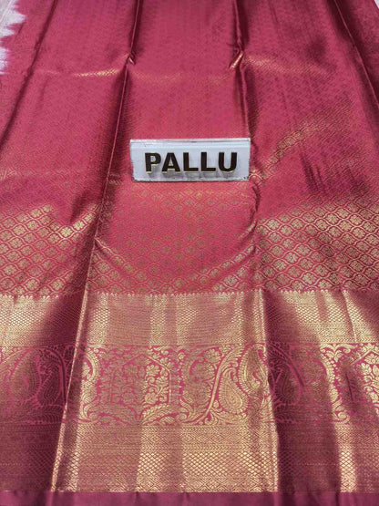 Maroon saree with gold patterns and a label indicating 'Pallu' on a white background