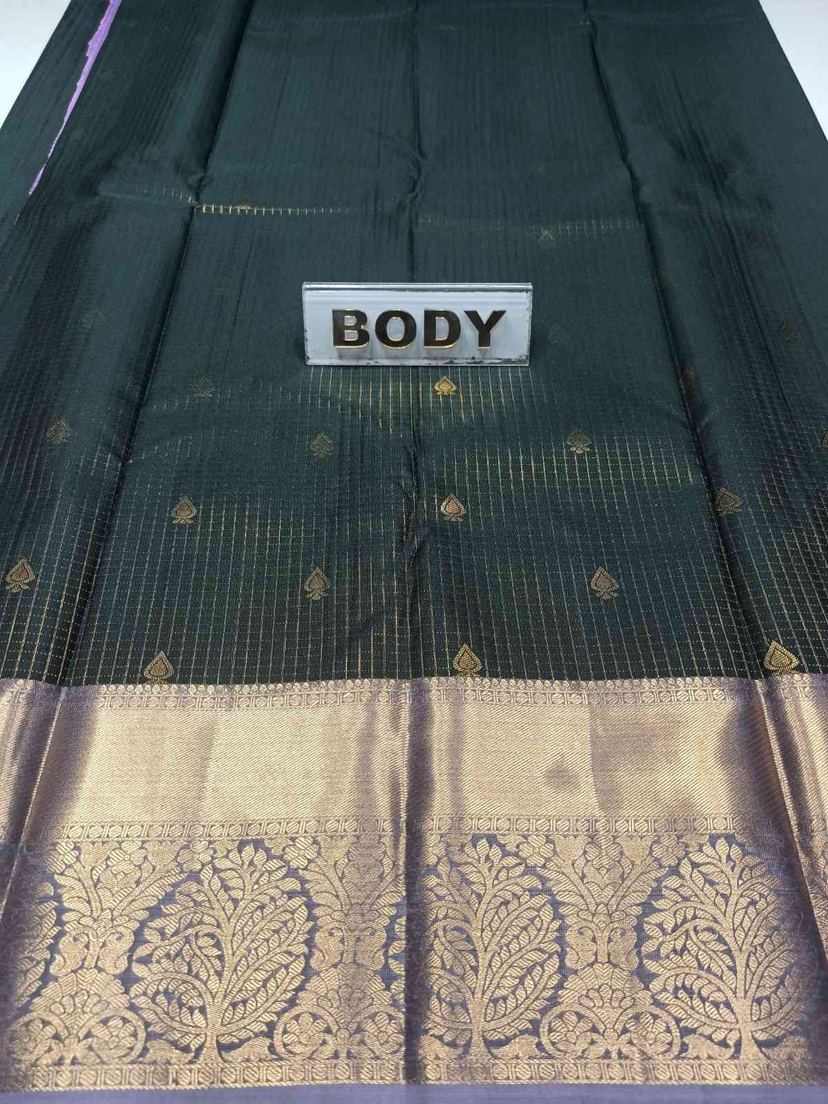 Dark green saree with gold border and 'BODY' label on a white background