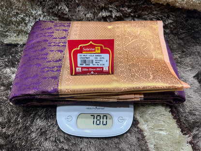 Packaged product with a label on a textured surface, weighed using a digital scale.