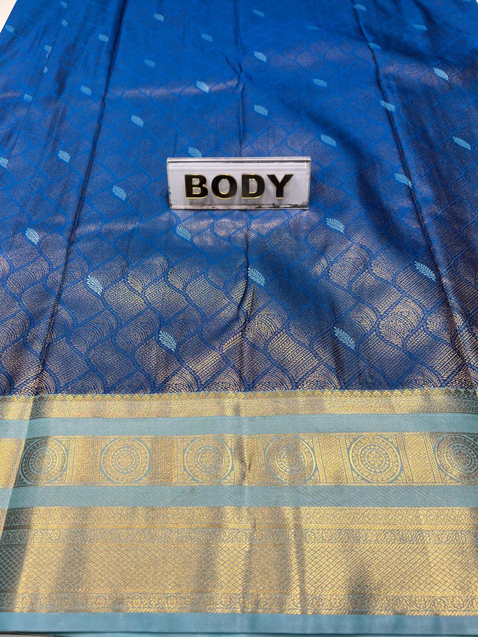 Blue fabric with gold border and 'BODY' label