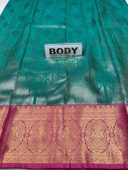 Green saree with a pink border and 'BODY' label.