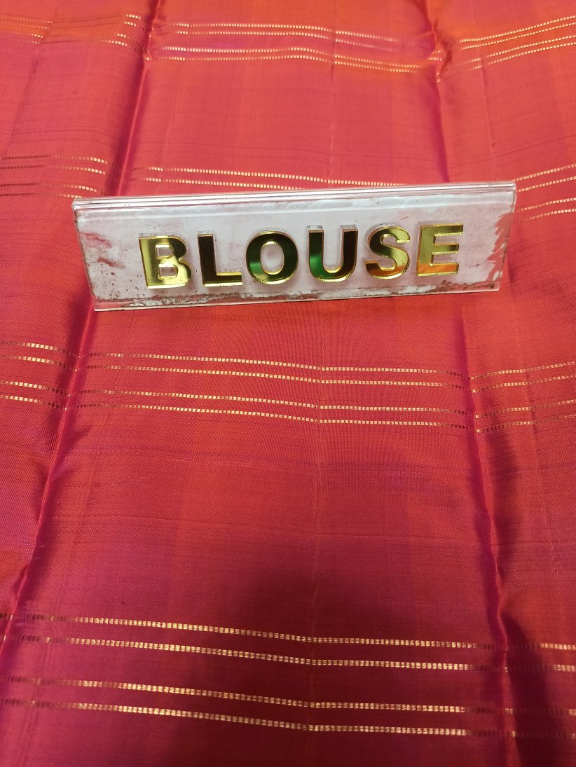 Pure Kanchipuram Silk Saree.