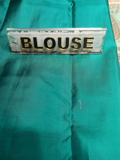 Pure Kanchipuram Silk Saree.