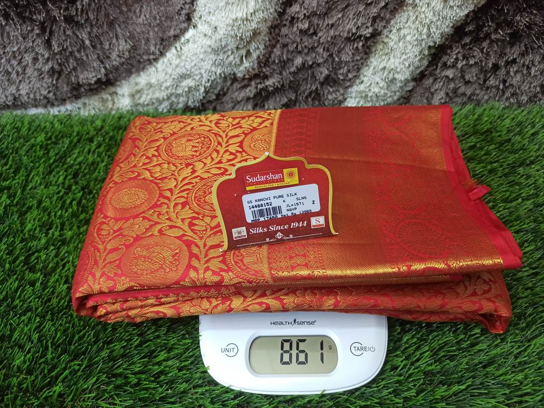 Pure Kanchipuram Silk Saree.