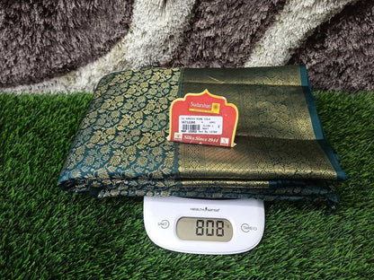 Pure Kanchipuram Silk Saree.