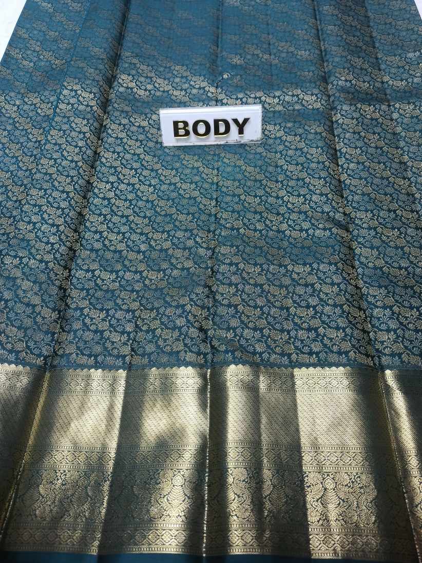 Pure Kanchipuram Silk Saree.