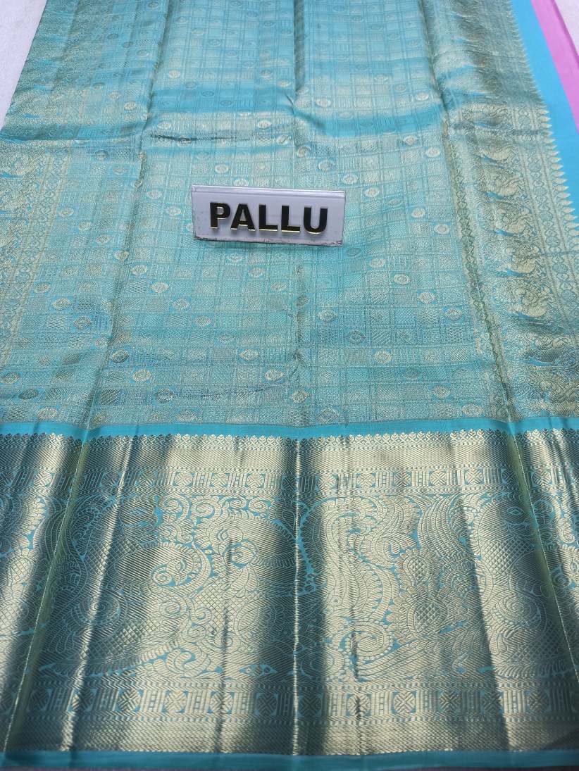 Pure Kanchipuram Silk Saree.