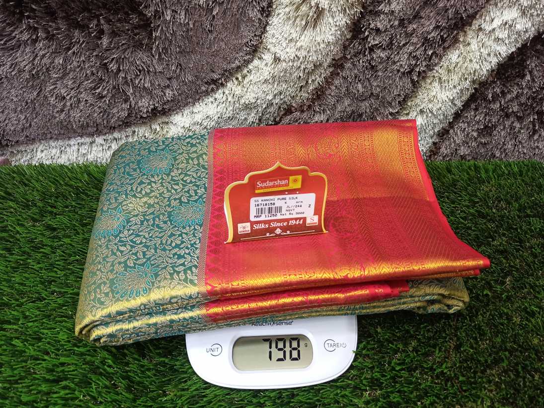 Pure Kanchipuram Silk Saree.