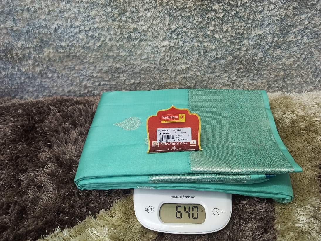 Pure Kanchipuram Silk Saree.