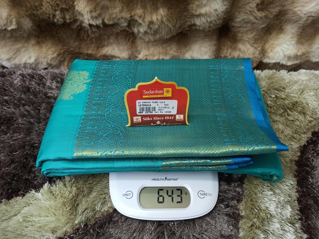 Pure Kanchipuram Silk Saree.