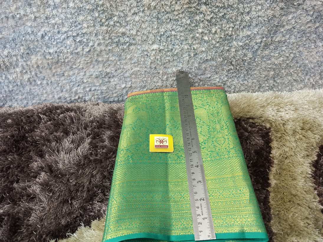 Pure Kanchipuram Silk Saree.