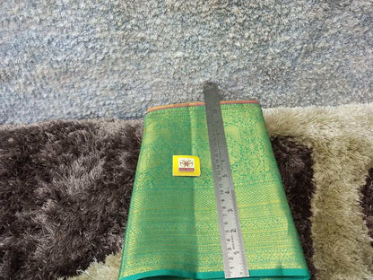 Pure Kanchipuram Silk Saree.