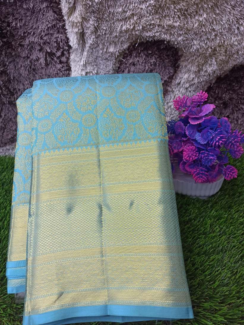Pure Kanchipuram Silk Saree.