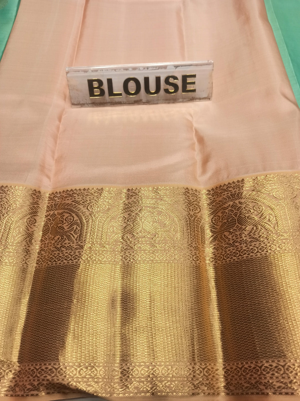 Pure Kanchipuram Silk Saree.