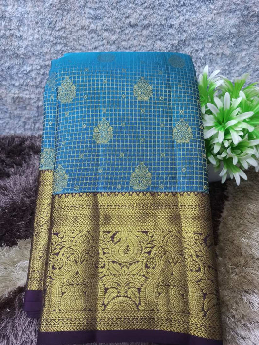 Pure Kanchipuram Silk Saree.