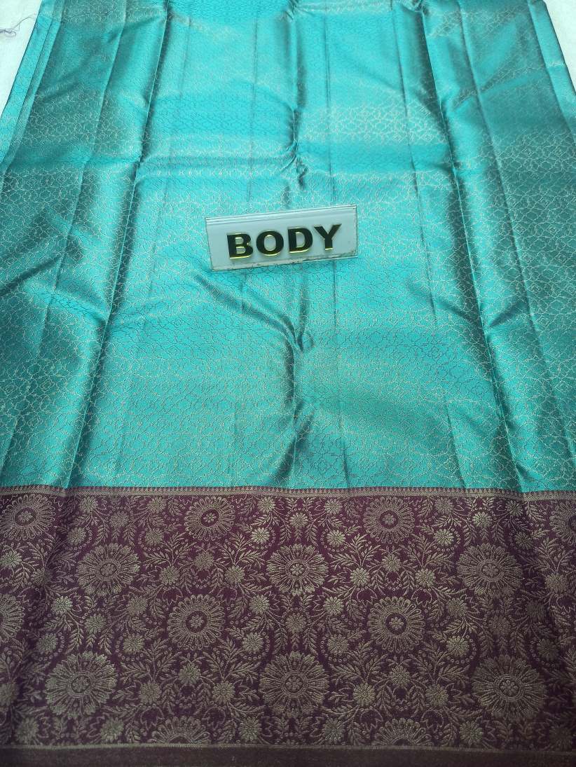 Pure Kanchipuram Silk Saree.