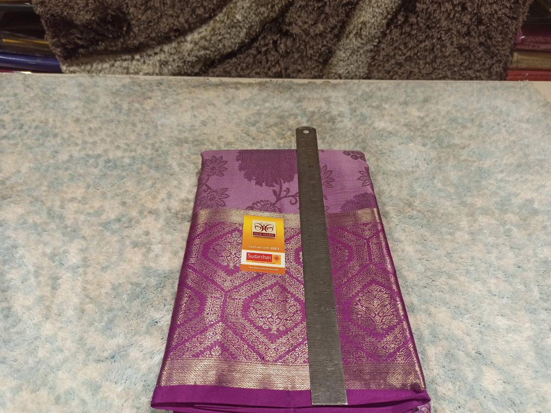 Pure Kanchipuram Silk Saree.