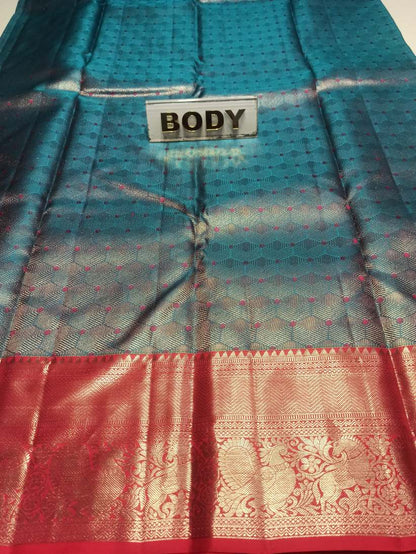 Pure Kanchipuram Silk Saree.