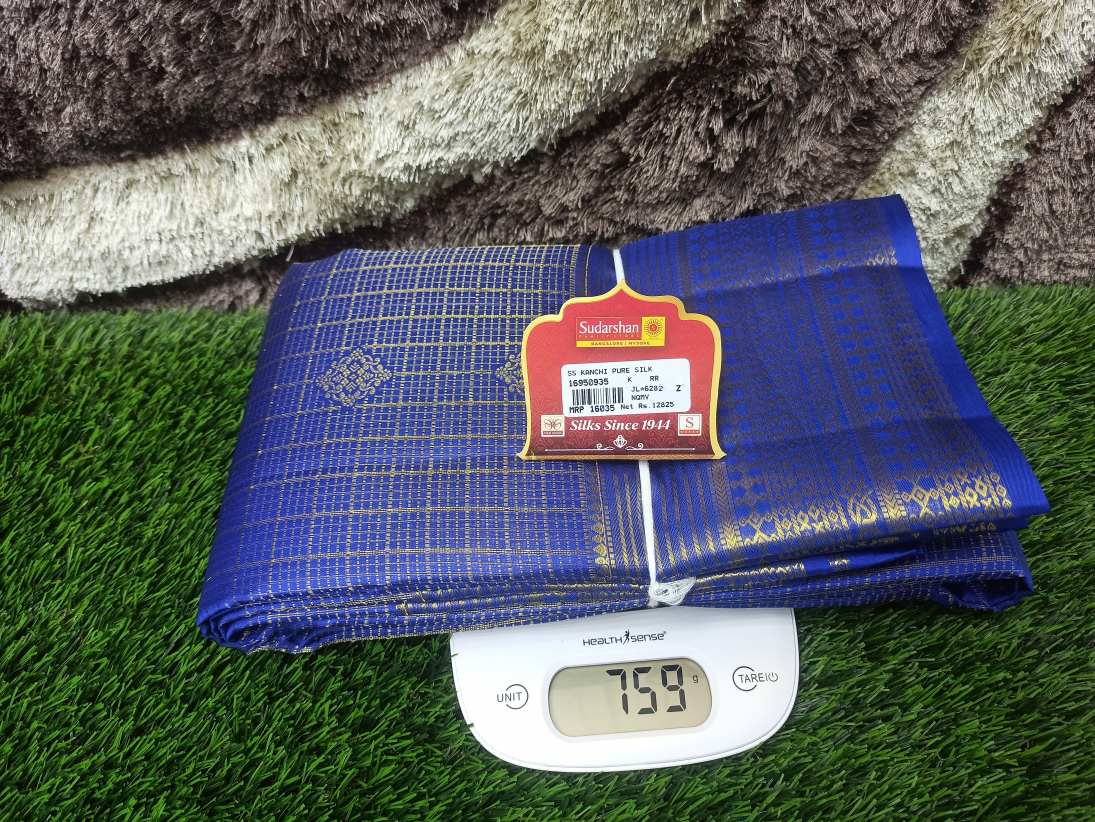 Pure Kanchipuram Silk Saree.