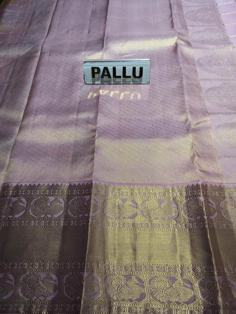 Pure Kanchipuram Silk Saree.
