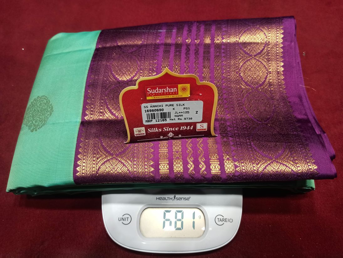 Pure Kanchipuram Silk Saree.