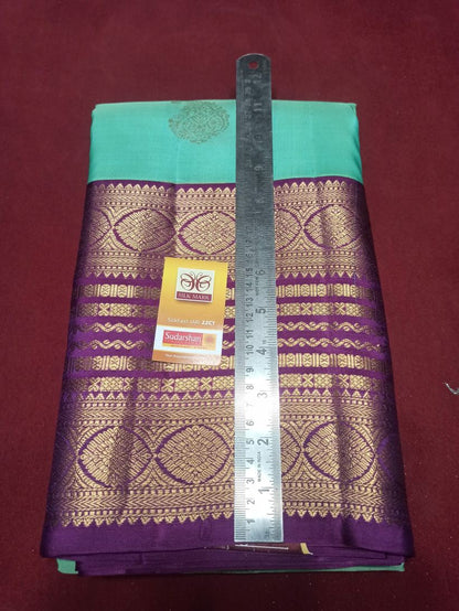 Pure Kanchipuram Silk Saree.