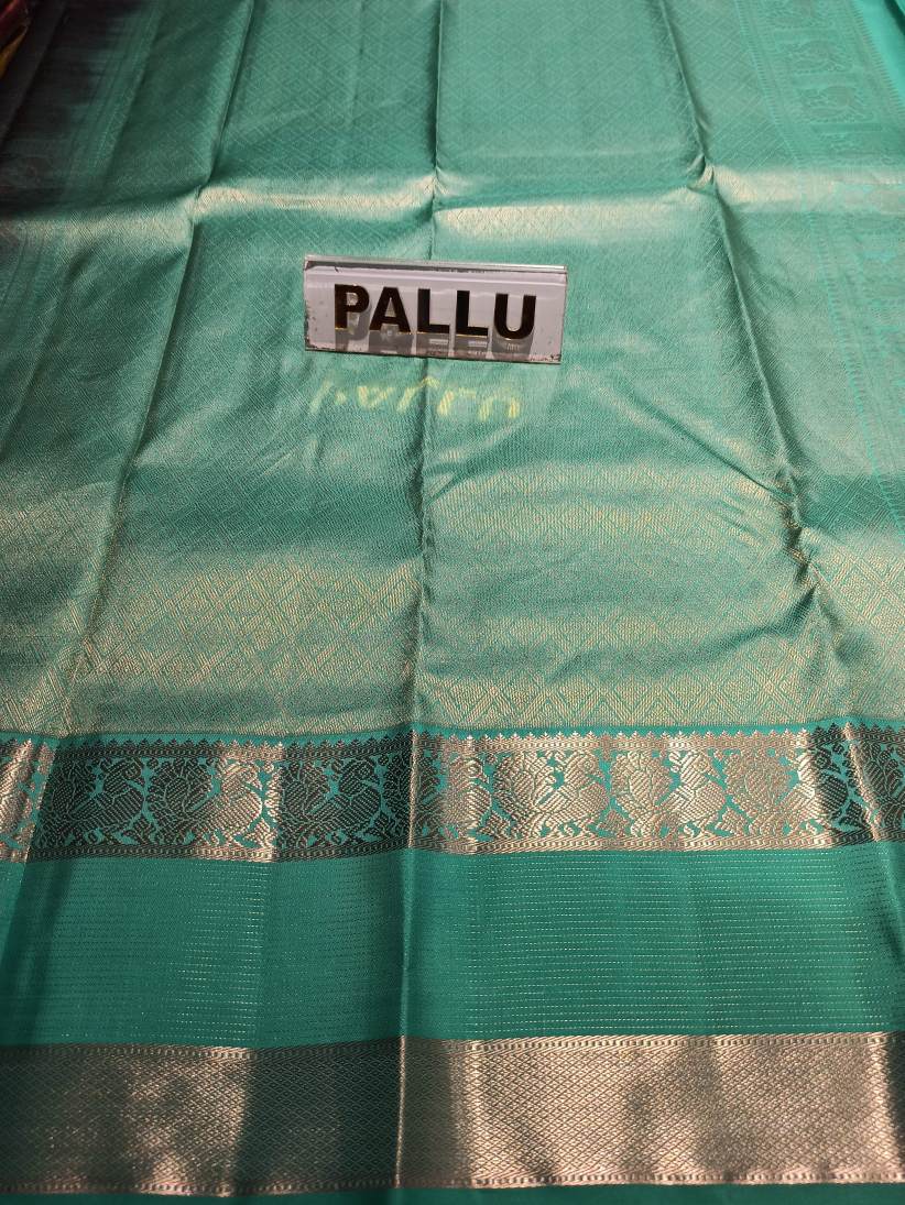 Pure Kanchipuram Silk Saree.