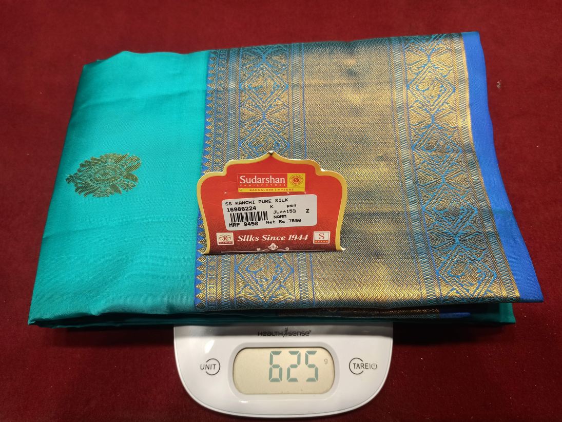 Pure Kanchipuram Silk Saree.