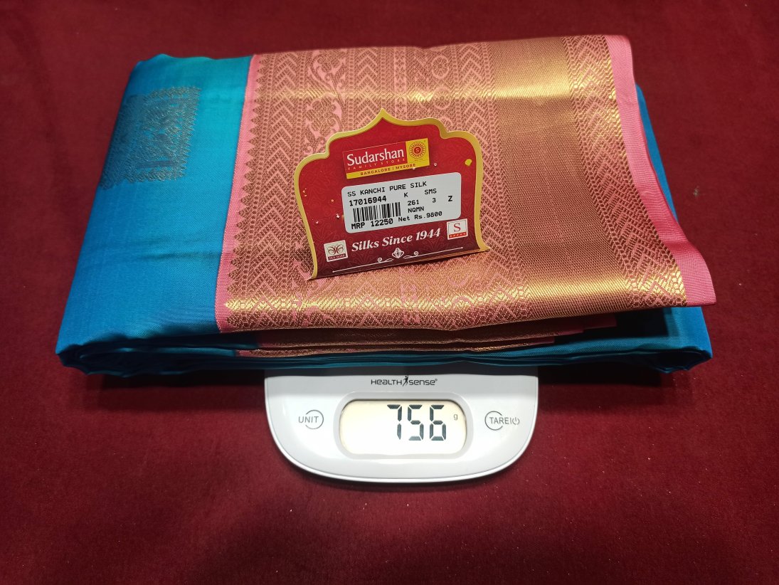 Pure Kanchipuram Silk Saree.