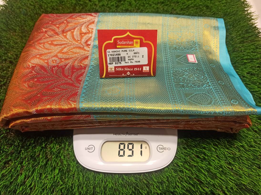 Pure Kanchipuram Silk Saree.