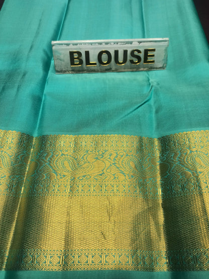 Pure Kanchipuram Silk Saree.