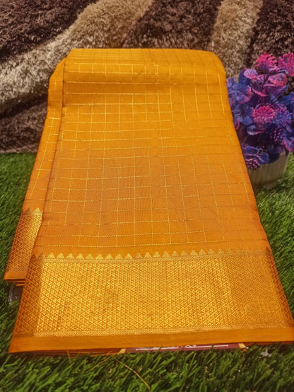 Pure Kanchipuram Silk Saree.