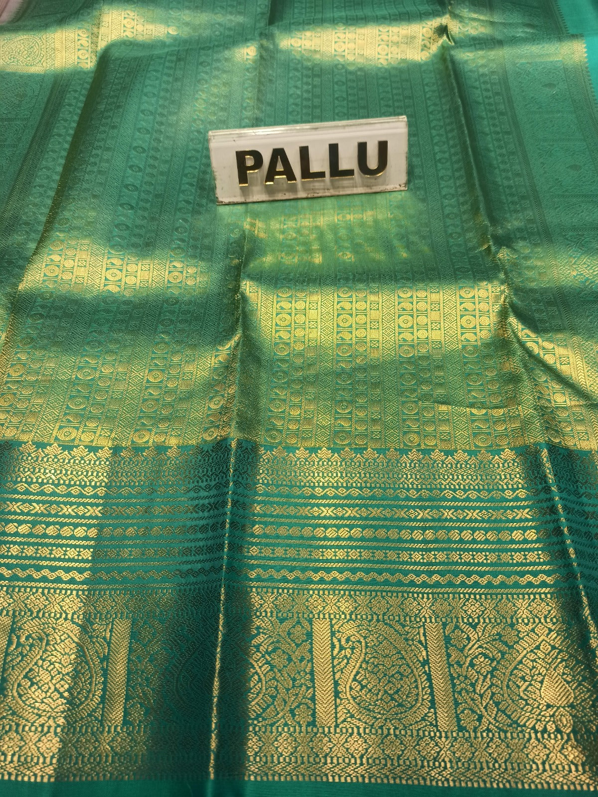 Pure Kanchipuram Silk Saree.