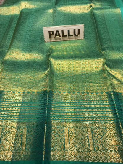 Pure Kanchipuram Silk Saree.