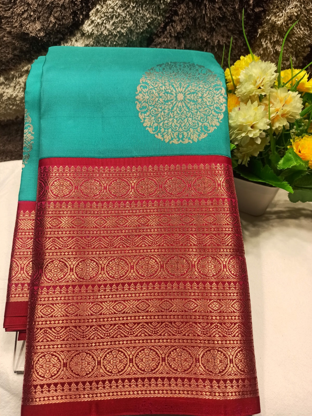 Pure Kanchipuram Silk Saree.